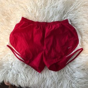 Red Nike shorts, L